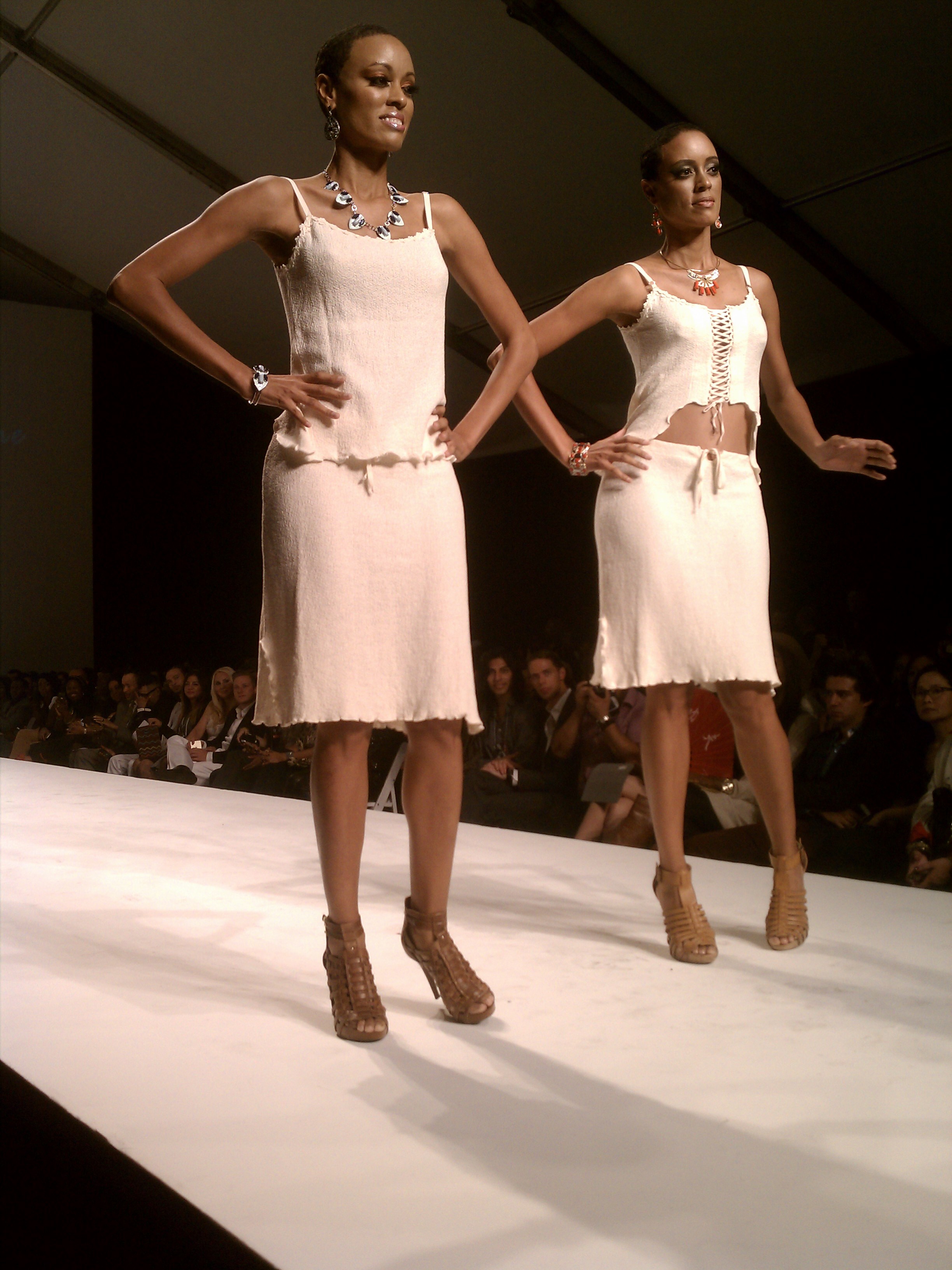 Beautiful twin models sashay down the runway with their casual, but elegant Skin Tone dresses  