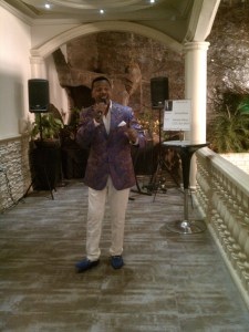 Musician Jerome Dean sings melodious tunes for guests.  