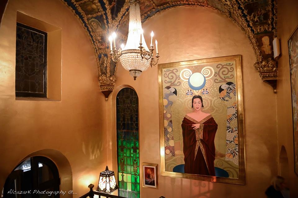 The entryway of Sue Wong's palatial estate with her Klimt inspired portrait welcomes visitors. Photo courtesy of Ken Alcazar Photography 