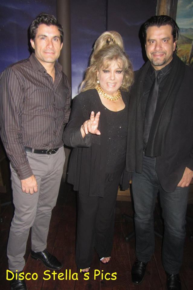 Family media mavens...Solecito Vazquez in her signature pose is flanked by her sons Cesar and Joss Gomez. Photo courtesy of Disco Stella