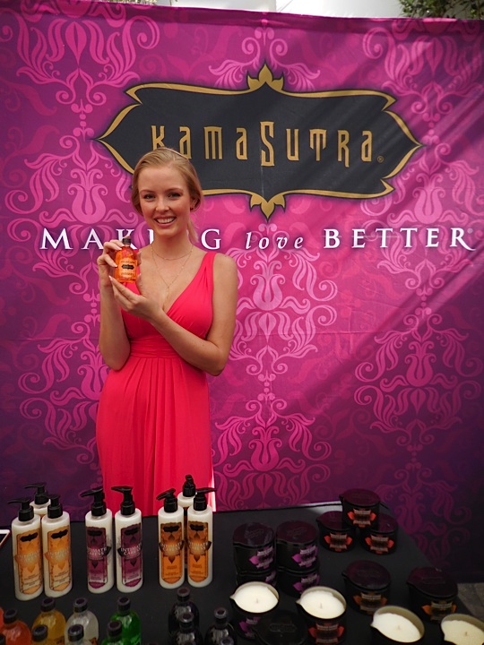 Christine from Kama Sutra holds up one of their amazing oils