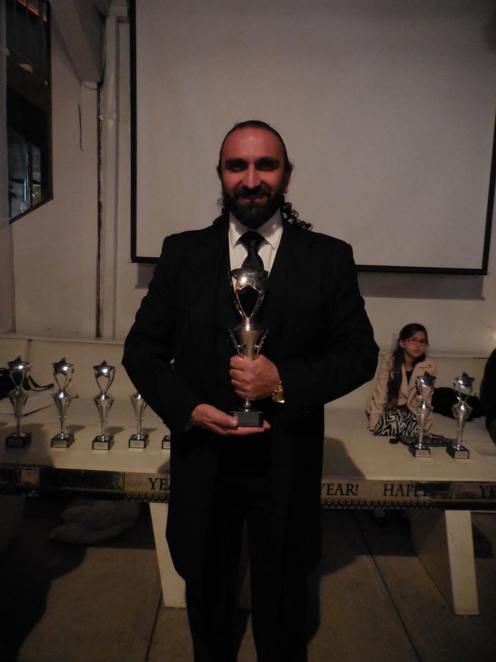 And the Friendship award goes to...Honoree Hovhannes Babakhanyan and his award. 