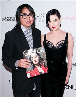 GENLUX's creative director and photo editor Stephen Kamifuji with Von Teese and her Winter issue cover. Photo courtesy of Gabriel Olsen/Getty Images Collection