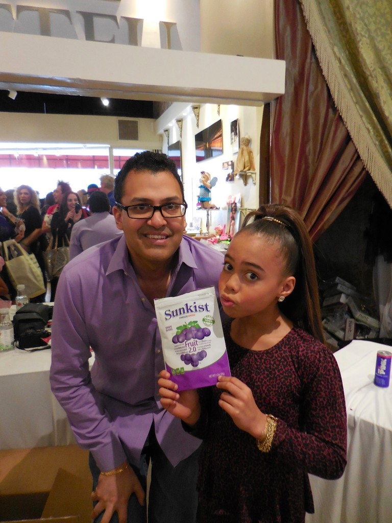 Nick Desai, CEO of Snack It Forward LLC with actress and dancer Asia Monet