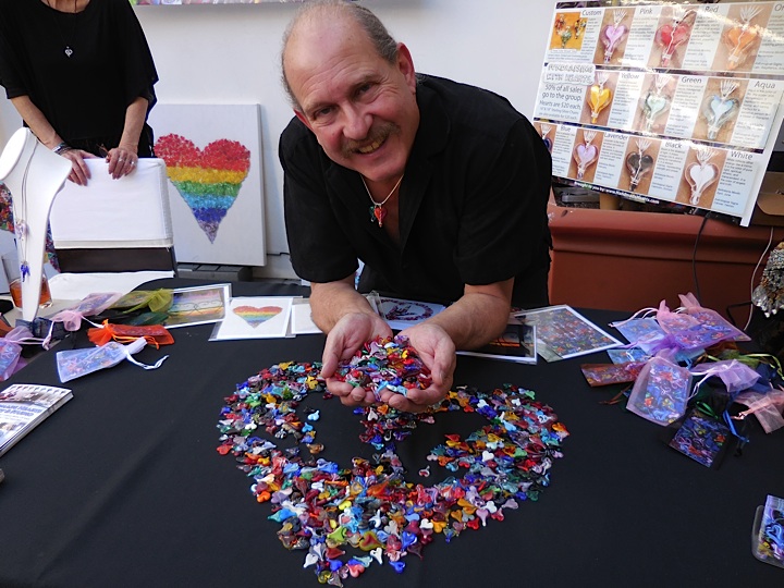 Have a heart...Hillel Rzepka, artist and creator of Handmade Hearts holds ups his colorful hearts