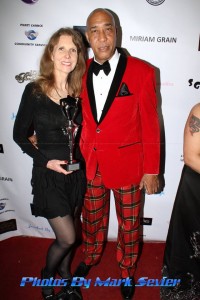 Celebrity photographer and award recipient Sheri Determan is all smiles on the red carpet with Eugene. Photo courtesy of
