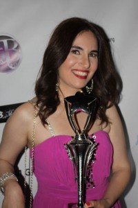 Photo of yours truly on the red carpet with my award. Hair by Drybar and makeup by Blushington. Dress by Ally Fashion and jewelry and purse by the Mitra Collection. Photo courtesy of Roland De Guzman