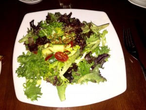 The salad was fresh and elegantly presented