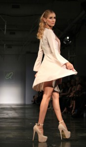 Model twirls in a dress from the ready-to-wear line. All photos courtesy of Burris Agency Staff