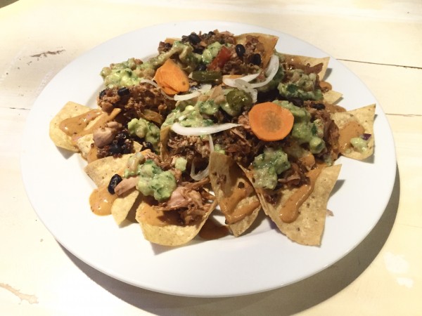 The vegan Nachos at eLOVate are out of this world! It's worth a trip to Santa Monica just to try these! Photo courtesy the Experience Magazine