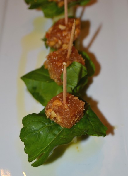 Manchego "pintxo" with quince rolled in Marcona almonds and arugula Photo courtesy of Judy Hansen Pullos
