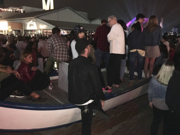 People were standing in the boat in front of Bubba Gump's in order to see the concert!