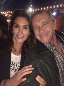 Cindy Crawford(L) with journalist and photographer, Dustin Brown(R). Photo courtesy the Experience Magazine 